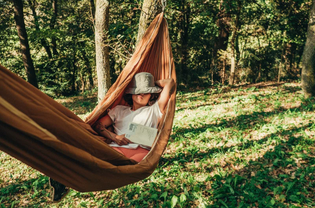 Person taking a short nap outside for a break